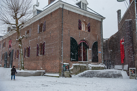People try to walk on slippery snow. A Code Orange weather warning was issued for most of the Netherlands on Wednesday morning, with heavy snow expected and persistent, icy roads.
The Dutch infrastructure agency, Rijkswaterstaat, is urging road users to work from home as much as possible on Wednesday.