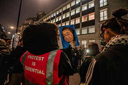 A pro-Palestinian supporter holds up a picture of a dead child in Gaza, the reason that the Palestine Action detainees are on hunger strike. Hundreds of pro-Palestinian supporters held an emergency rally outside the Ministry of Justice, calling on the Justice Secretary David Lammy to recognize the demands of eight Palestine Action hunger strikers. These comprise a third of the Filton 24 who are currently in remand awaiting trial for break-ins at the UK subsidiary of Elbit Systems, arms supplier to Israel. Some of the hunger strikers are now past their 50th day of hunger strike and are entering the critical life-threatening stage.