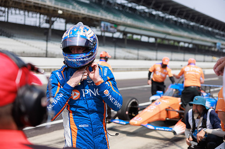 IndyCar driver Scott Dixon (9) at a pit stop during practice runs for the 2023 Indy 500 at Indianapolis Motor Speedway in Indianapolis.