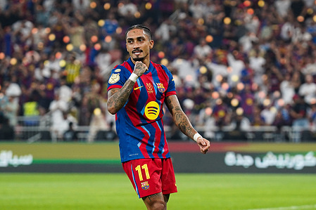 Barcelona's Raphael Dias Belloli, known as Raphinha celebrates during the Spanish Super Cup final match between Barcelona and Real Madrid at King Abdullah Sports City. Final score: Barcelona 3 - 2 Real Madrid.
