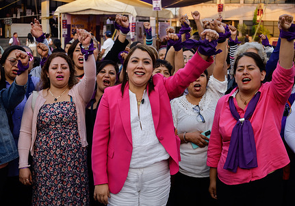 Berenice Hernández Calderón (wearing a pink jacket), mayor of Tláhuac seen during the installation of a totem pole in Mexico City, commemorating International Women's Day, celebrated on March 8th each year. According to the United Nations, International Women's Day is commemorated in many countries around the world. When women from all continents, often separated by national borders and ethnic, linguistic, cultural, economic, and political differences, unite on this day, they can reflect on a tradition of at least ninety years of struggle for equality, justice, peace, and development.