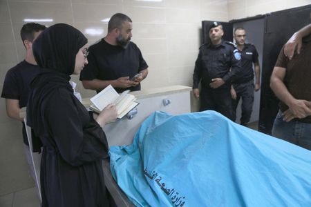 (EDITOR'S NOTE: Image depicts death) 
The family of Marwan Herzallah weeps beside their father's body at Rafidia Hospital in Nablus, in the West Bank. The Israel Prison Service handed over the body of 54-year-old Marwan Herzallah to his family. Harzallah was detained in January 2026 before Israeli authorities announced his death on March 28, 2026, inside Megiddo Prison. Prisoner advocacy organizations allege that Harzallah’s death was a result of a policy of denying necessary medical treatment and healthcare to prisoners.