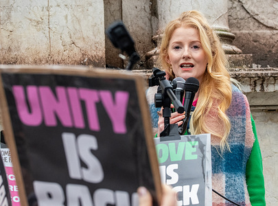 Newly elected Green MP, Hannah Spencer, gives a speech stressing unity. In her speech, newly elected MP Hannah Spencer, said “ I’m tired of politicians blaming everyone else for their mistakes. I’m tired of minorities being scapegoated. Us coming together, working together and sticking TOGETHER is the only way we can bring about change and hope in the current political landscape.” She was later bundled into a police car after being pursued by right wing streamers following her speech. Launch of 'TOGETHER' billed as the first public appearance of the newly elected Green MP, for Gorton & Denton, in the city following her election victory in Manchester. TOGETHER is Advertised as ‘ Making a stand against the far right’.