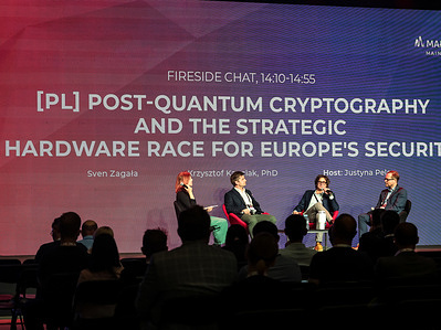 People listen to a panel discussion during the second day of CyberSec Expo in Tauron Arena.