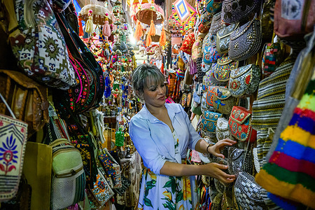 People are shopping ahead of the Muslim festival of Eid al-Adha at Souq Waqif Traditional Market. Muslims across the world are preparing to celebrate the annual festival of Eid al-Adha, or the Festival of Sacrifice, which marks the end of the Hajj pilgrimage to Mecca and in commemoration of Prophet Ibraham's readiness to sacrifice his son to show obedience to God.