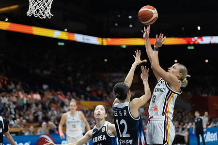 Alexandra Wilke of Germany (R) and Haeran Lee (L) of Korea seen in action during the qualification to quarterfinals round of the 2026 FIBA Women's World Cup between Germany and Korea at Uber Arena. Final score; Germany 94:56 Korea.