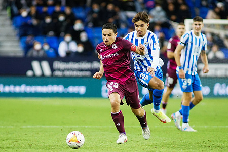 Luca Sangalli (L) of Real Sociedad B and Kevin Villodres (2nd R) of Malaga CF seen in action during the La Liga Smartbank match between Malaga CF and Real Sociedad B at La Rosaleda Stadium, in Malaga
(Final Score Malaga CF 2:1 Real Sociedad B)