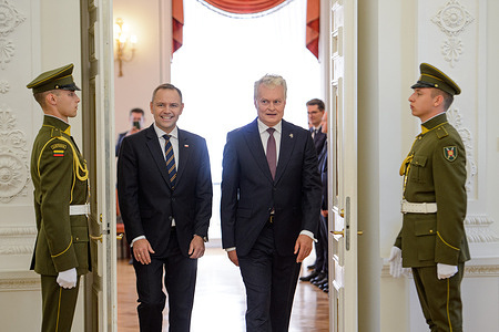 Polish President Karol Nawrocki (2nd L) and Lithuanian President Gitanas Nauseda arrive for a joint meeting at the Presidential Palace in Vilnius. Polish President is on a working visit to Lithuania, where he held a bilateral meeting followed by a joint press conference with Lithuanian President Gitanas Nauseda. This is Nawrocki’s third international trip since taking office, after the United States and the Vatican, and his first to the Baltic region.