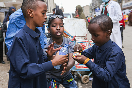Kenyan Somali children light up fireworks at Jackson Muriethi street in Eastleigh during Eid-Ul-Fitr celebrations. Muslims in Kenya celebrate Eid-Ul-Fitr, which marks the end of the Holy month of Ramadan.