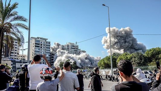 Smoke rises as an Israel airstrike hits a building in Chiyah, Beirut, following an evacuation warning by the Israeli military. Israel hit 30 sites in Beirut's southern suburbs within 48 hours this week, the Israeli Military said.