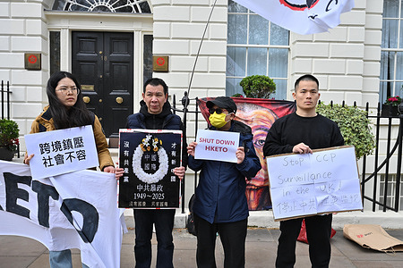 Protesters hold placards outside HKETO office during the rally. Protesters gathered outside the Hong Kong Economic and Trade Office in Bedford Square for a demonstration calling for its closure amid concerns over the role of foreign government institutions in the United Kingdom. The protest, supported by Hong Kong diaspora groups and activists, highlights issues of national security, transparency and political influence, as an ongoing UK legal case involving the office draws public attention.