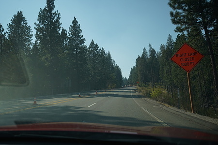 Highway 50 is pictured empty due to the Caldor fire.
Caldor Fire Evacuation orders for South Lake Tahoe city downgraded to warnings, people are now allowed go back to their homes. Parts around Highway 50 in South Lake Tahoe are still closed; there is no car on the Highway 50 except police car and fire truck.