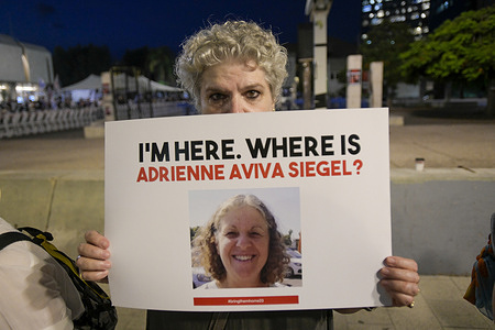 A relative holds a portrait of Adrienne Aviva kidnapped by Hamas in Israel on October 7 during the demonstration. Dozens of relatives and friends of the people kidnapped by Hamas on October 7, demonstrated peacefully in the city of Tel Aviv. These demonstrations were made after the Israeli government recognized that 7 of the hostages were killed after one of their incursions into the Strip. Protesters are calling on the government to act to bring their loved ones back safely.