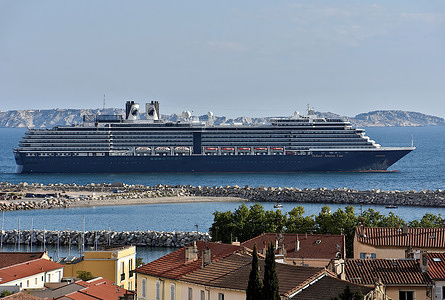 The Oosterdam cruise liner of the Holland America Line shipping company leaves the French Mediterranean port of Marseille.