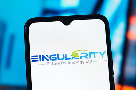 In this photo illustration, the Singularity Future Technology logo is seen displayed on a smartphone screen.