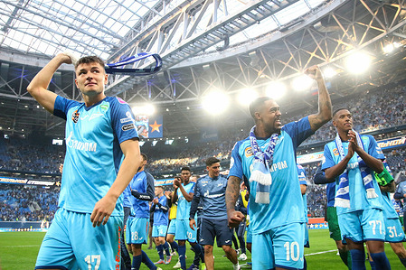 Malcom Filipe Silva de Oliveira, known as Malcom (10), Andrey Mostovoy (17), Robert Renan (77), Zenit Football Club players seen after the end of the match of the 26th round of the Russian Premier League season 2022/2022, Zenit - Spartak, where Zenit football club became the Champion of Russia in football.Zenit 3:2 Spartak.