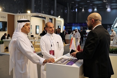 People seen discussing in the Cityscape Qatar 2025 real estate exhibition, held at the Doha Exhibition and Convention Center. Cityscape Qatar will bring together more than 70 leading developers, with deals expected to reach over QAR 400 million.