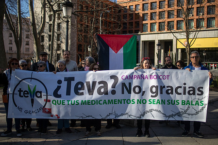 A group of protesters carry a banner during the demonstration. Protesters stage a demonstration as part of the State-wide boycott campaign as they chant: "Teva? No, thanks." against the Israeli pharmaceutical company Teva for its complicity in the occupation of Palestine.