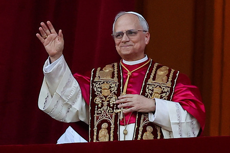 The new pontiff appears on the central balcony of St. Peter's Basilica. Pope Leo XIV is an American Cardinal called Robert Francis Prevost and the successor to Pope Francis. The conclave met in the Sistine Chapel.