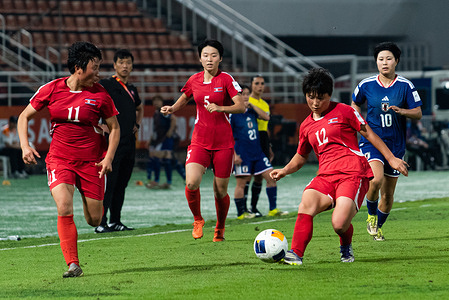 Choe Rim Jong #11 and Kang Ryu Mi #12 of North Korea seen in action during the AFC U-20 Women's Asian Cup final match between Japan and North Korea at Thammasat stadium. Final score; Japan 1:0 North Korea.