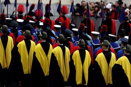 Italian soldiers of various military forces line up in front of St. Peter's awaiting the Pope. Pope Leo XIV presided over his first Christmas Mass at the central altar of St. Peter's Basilica in the Vatican, during the solemn celebration that opens Christmas for the Catholic Church, reminding the faithful of the message of peace, hope, and the birth of Jesus.