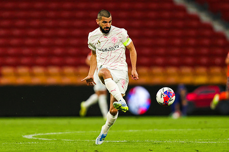 Melbourne City Captain Aziz Behich passes the ball in the A Leagues Men match versus Brisbane Roar. Melbourne City defeated Brisbane Roar 3-2.