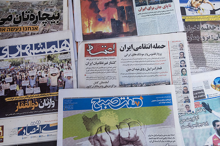 Iranian newspapers on the first day of publication in Iran after three days of war between Israel and Iran. In the late hours of Friday night, June 13, Israel launched missile and drone attacks against Iran and assassinated several senior Iranian military commanders. In response, Iran retaliated with hundreds of drones and missiles, and the conflict has now continued for three days.
Now, after three days, these newspapers are the first to be published during the course of this conflict.