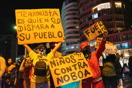 Protesters hold placards expressing their views during a demonstration against President Daniel Noboa in Quito’s financial district. Hundreds of protesters marched through Quito’s financial district to denounce President Daniel Noboa’s economic policies, voicing anger over rising living costs and government reforms. The demonstration reflected growing public frustration as Ecuador continues to face inflation, unemployment, and security challenges.