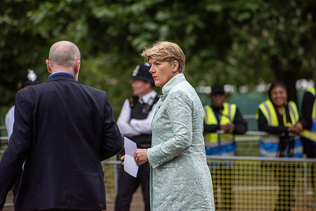 The English television presenter, Clare Balding talks with her colleague before the live coverage of the "Trooping the Colour" military parade. The BBC and Channel 4 broadcast journalist and television presenter, Clare Balding works on the Mall in London, UK.