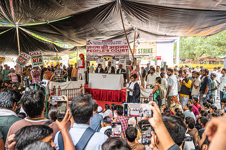 People seen watching a mock public court performance titled "Janata Ki Adalat" during the Cockroach Janta Party (CJP) protest, The theatrical performance symbolically puts Union Education Minister, Dharmendra Pradhan on trial over education-related issues at Jantar Mantar . Climate activist Sonam Wangchuk continues his indefinite hunger strike for the 15th consecutive day in support of the Cockroach Janta Party (CJP) protest. The demonstrators are demanding accountability, transparency, and comprehensive reforms in the education system. They are also calling for the resignation of Union Education Minister Dharmendra Pradhan over examination-related controversies. Wangchuk's hunger strike has become the focal point of the peaceful movement, drawing the attention of students, social activists, and various sections of civil society.