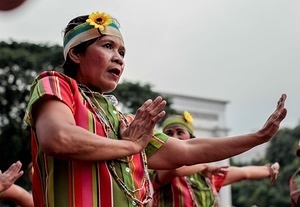 Marikina Sports Center,Marikina,NCR,Philippines, Marikina, NCR, Philippines - 11/12/2017: A 65 Year Old Woman of the Senior Citizens Association powerfully dances to the beat of traditional folk step in their region.The Biggest Annual Philippine Rehiyon-Rehiyon Festival was once again celebrated this month with the theme “Unity In Diversity” which the main goal is to unite all individuals coming from different region in the nation. The festival showcases the diverse culture and attitudes of Filipinos around the country to bond as one in a big dance celebration. It serves as a tribute to local groups/community who came from other regions of the country and choose to stay and settle in the city.