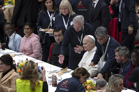Pope Leo XIV shares lunch with the poor during the Ninth World Day of the Poor in the Paul VI Hall at the Vatican.