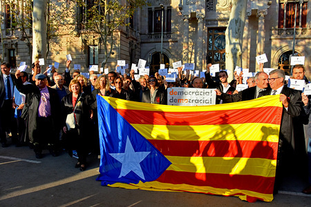 A group of lawyers from the Supreme Court of Justice of Catalonia in favour of independence are seen holding A Catalonia flag while claiming helps from Europe for the upcoming referendum on 1st October, 2017.
About 200 lawyers take part in a protest, front of the gates of the TSJC demanding courage to judges and prosecutors to "apply rights and justice without any political instruction", have said in the manifesto that they have read as lawyers have announced complaints against policemen on Sunday.
