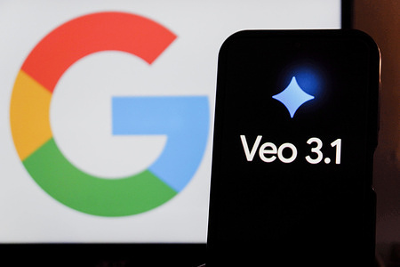 In this photo illustration, Google Gemini Veo 3.1 logo is displayed on a smartphone screen with a Google logo in the background.