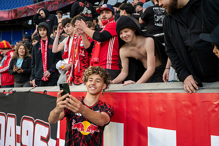 Adri Mehmeti (15) of the New York Red Bulls poses for photos with fans following a 1–0 victory over the New England Revolution at Sports Illustrated Stadium in Harrison, NJ, on February 28, 2026. Red Bulls New York defeats New England Revolution 1-0. Red Bulls New York hosts New England Revolution in an MLS regular-season match at Sports Illustrated Stadium in Harrison, NJ. Red Bulls New York defeats New England Revolution 1-0.