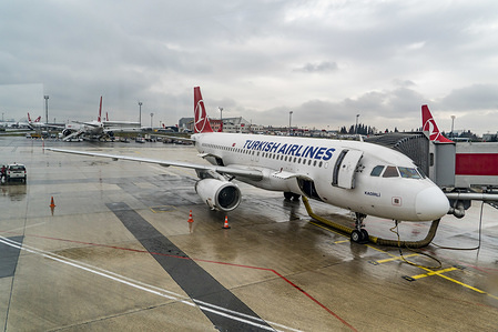 Turkish Airlines airplanes are seen at the Istanbul Ataturk Airport during a rainy day. Turkish Airlines is a state owned airline, member of Star Alliance, with 329 airplane fleet and 220 more aircraft orders. Istanbul IST/LTBA airport will soon be replaced by the new Istanbul Mega Airport.