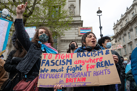 Protesters chant slogans outside Downing Street during the rally. Trans rights activists staged a counter-demonstration in Westminster opposing a march by the group “199 Days Later”, amid ongoing debate over transgender rights and access to single-sex spaces in the United Kingdom. Protesters gathered with banners and placards expressing support for trans rights and criticizing what they describe as discriminatory policies.