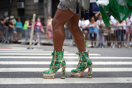 A person seen with unique footwear at the Pride march. Thousands of people came out to celebrate the 55th annual Pride Day parade and PrideFest. The theme was "The challenges we face today with the political climate requiring us to stand together in solidarity".