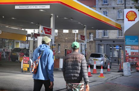 Pedestrians pass the digital display showing diesel prices at over £2 per litre at a Shell garage on Whitechapel Road, London. Fuel prices are hitting record highs around the UK with the continued war in Iran and the blocking of the free movement of tankers in the Strait of Hormuz by both Iran and the United States. The RAC has now declared the average price per litre of diesel across the UK is over £2.00.