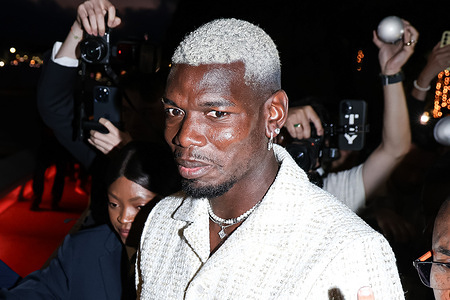 French footballer Paul Pogba, is seen arriving at the Le Grand Dîner party during the 78th Festival de Cannes.