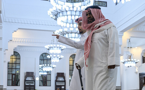 Qatar worshippers arrive at a mosque before prayers to commemorate Laylat al-Qadr (Night of Destiny) during the holy month of Ramadan. Laylat al-Qadr is believed to be the night when the Quran was first revealed to Prophet Muhammad.