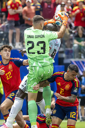 Spain goalkeeper Unai Simon (23) and Belgium's Romelu Lukaku (9) seen in action during the FIFA World Cup quarterfinal soccer match at SoFi Stadium.