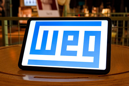 In this photo illustration, the logo of WEG is displayed on the screen of a tablet.