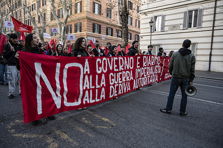 Protesters hold a banner during the demonstration. Around 10,000 people gathered in Rome on March 14 (“No Meloni Day”) to protest on several issues, including the war in the Middle East, concerns over freedom of speech, and opposition to proposed justice system reforms. Demonstrators united under the slogan “No Sociale” (“social no”), criticizing the reforms as a threat to the separation of powers. The rally also reflected growing political opposition and wider debate over government policies in Italy.