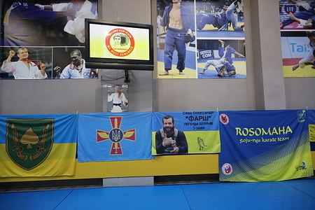 Flags of the Ukrainian Armed Forces, karate schools, and a flag featuring Oleksandr Svyshch (call sign Farsh) seen during the karate tournament at Arena Sport sports complex. A karate tournament in memory of fallen soldiers of the Ukrainian Armed Forces -Hero of Ukraine Oleksandr Svyshch (call sign Farsh) and Artem Orlyanskyi (call sign Tornado), was held in Odessa at the Arena Sport sports complex. The goal was to honor the memory of the fallen and foster patriotic feelings in the younger generation. Oleksandr Svyshch (call sign Farsh) was a Ukrainian serviceman, a soldier in the 3rd Separate Assault Brigade of the Ukrainian Armed Forces, and a Hero of Ukraine (2024, posthumously). He died near Bakhmut. A street in Odessa was renamed in his honor. Artem Orlyanskyi (call sign "Tornado"), a Ukrainian serviceman, served in the 95th Airborne Assault Brigade in a special reconnaissance unit. He was killed while carrying out a combat mission in the Khrvkva Oblast.