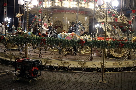 A child rides a generator-powered carousel at Greek Square. As a result of the massive combined attack on Odeshchina, on December 13, 2025, energy infrastructure facilities were damaged. This led to the power supply of low-level critical infrastructure to ensure the supply of water and heat. City hospitals have been transferred to autonomous operation from alternative power sources. Water and fuel supplies have been ensured. Pumping stations operate from generators. Transportation of technical water has been organized in all districts of the city.