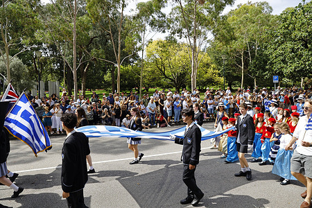 Participants are seen in a parade during the Greece National Day commemorations. Members of the Greek-Australian community gathered in Melbourne to celebrate Greece’s National Day, commemorating the start of the Greek War of Independence. The annual event features cultural performances, traditional dress, and community participation, highlighting the strong ties between Greece and Australia’s multicultural society.