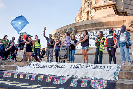 Protesters gather during the demonstration. Hundreds of Latin American migrants took to the streets close to the the iconic monument to Christopher Columbus, who began the colonisation of indigenous people in the Americas. They were demanding their rights and reminding people that on 12 October, known as Columbus Day, for them there is nothing to celebrate.
