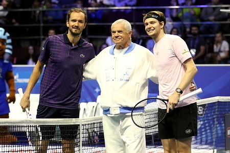 Daniil Medvedev of Russia (L), Alexander Medvedev, Advisor to the Chairman of the Gazprom Management Committee (C) and Alexander Bublik of Kazakhstan (R) play against each other during the International Team Tennis Tournament Trophies of Northern Palmyra 2025 at The Arena. Final score: (Alexander Bublik 5:2, 2:6, 2:6 Daniil Medvedev).