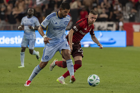 (L-R) Enea Mihaj and Maxime Dominguez are seen in action during the MLS game between Toronto FC and Atlanta United FC at BMO field. Final score; 1-1.